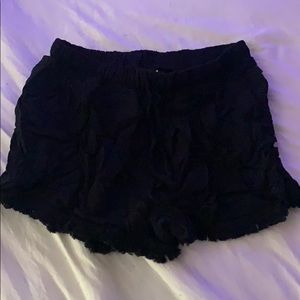 Flowy shorts with tassels on bottom